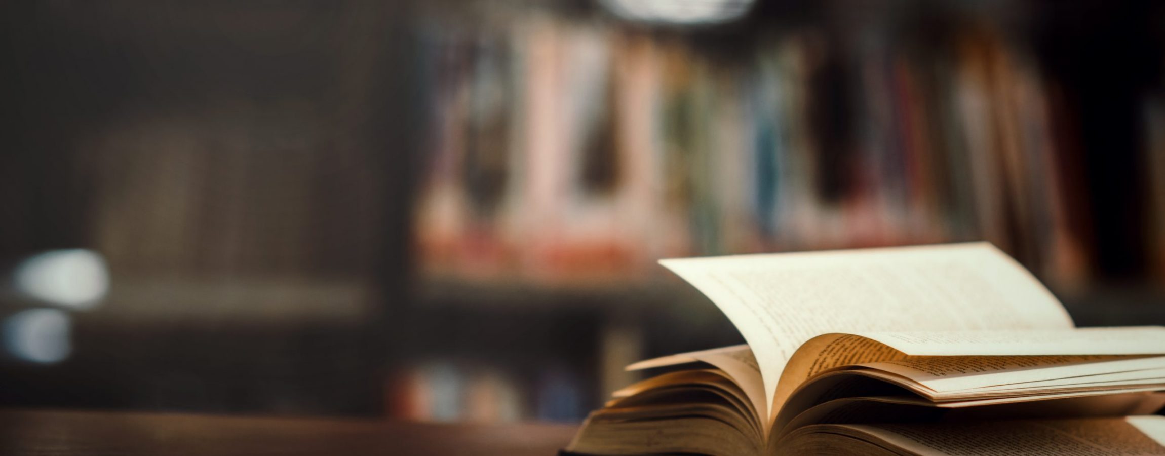 Book in library with open textbook,education learning concept